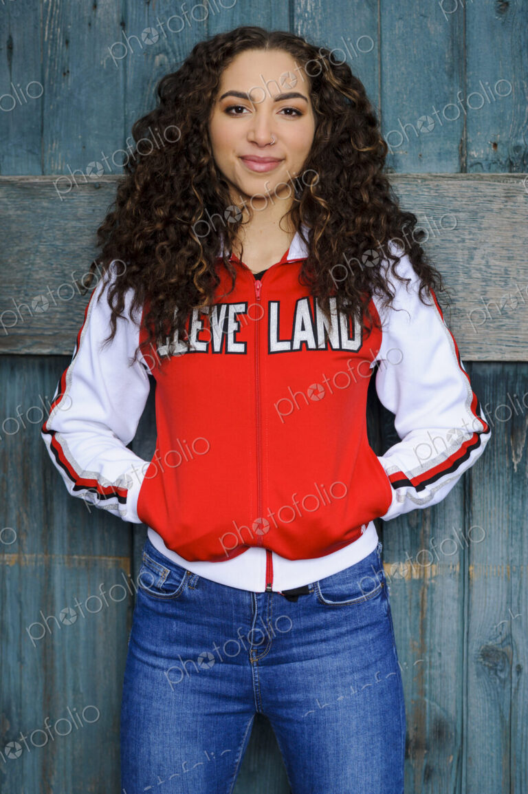 Mixed race woman wearing cleveland jacket