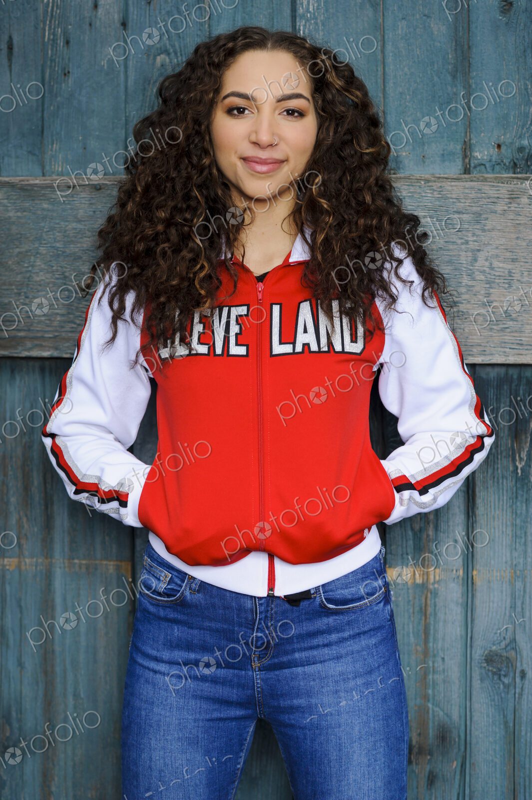 Mixed race woman wearing cleveland jacket