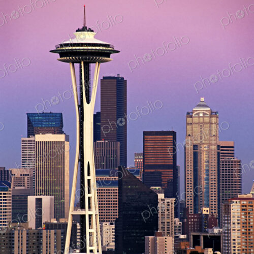 Modern Seattle skyline at sunset, including space needle and skyscrapers. Modern Seattle skyline at sunset, including space needle and skyscrapers.