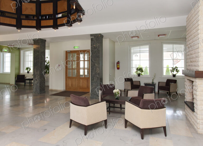 Modern building interior, hotel, reception area, pillars and tiled floor, fireplace…