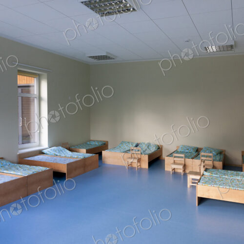 Modern day care nursery or pre-school kindergarten school, bedrooms for nap time Modern day care nursery or pre-school kindergarten school, bedrooms for nap time