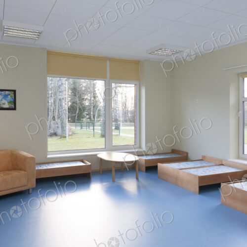 Modern day care nursery or pre-school kindergarten school, bedrooms for nap time Modern day care nursery or pre-school kindergarten school, bedrooms for nap time