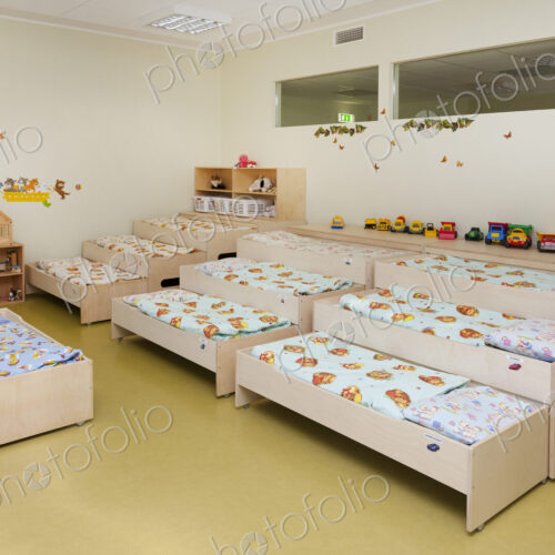 Modern day care nursery or pre-school kindergarten school, bedrooms for nap time, pull… Modern day care nursery or pre-school kindergarten school, bedrooms for nap time, pull…