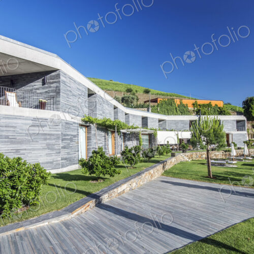 Modern hotel and wooden walkway Modern hotel and wooden walkway