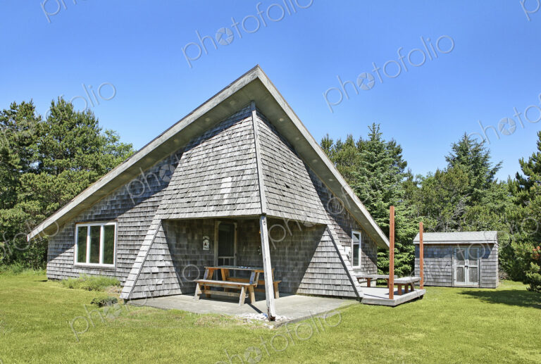 Modern house and lawn under blue sky