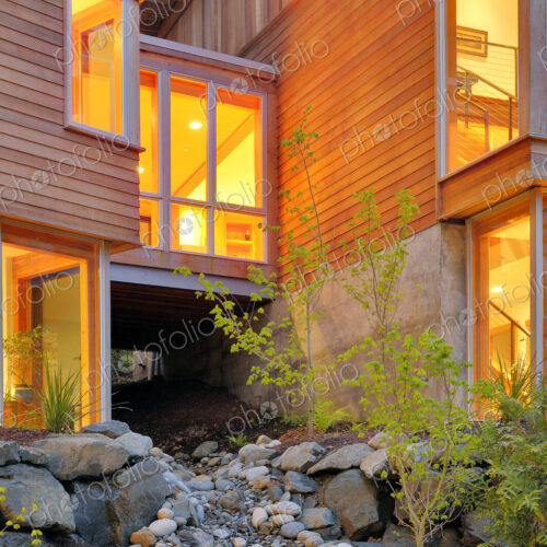 Modern house and rocky creek Modern house and rocky creek