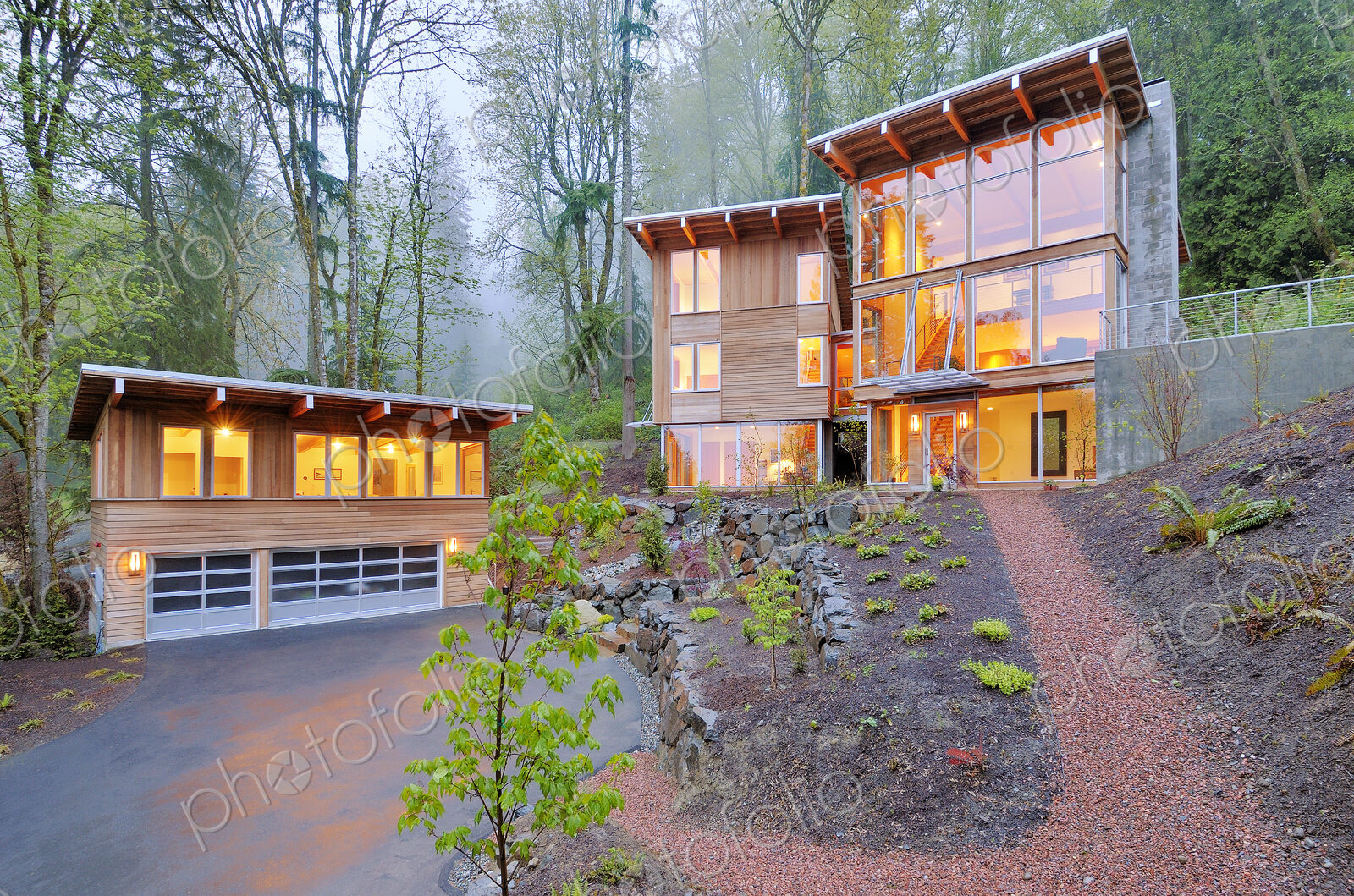 Modern house illuminated in woods