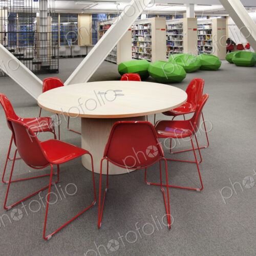 Modern study area at a college or university, bookshelves and public seating areas. Modern study area at a college or university, bookshelves and public seating areas.