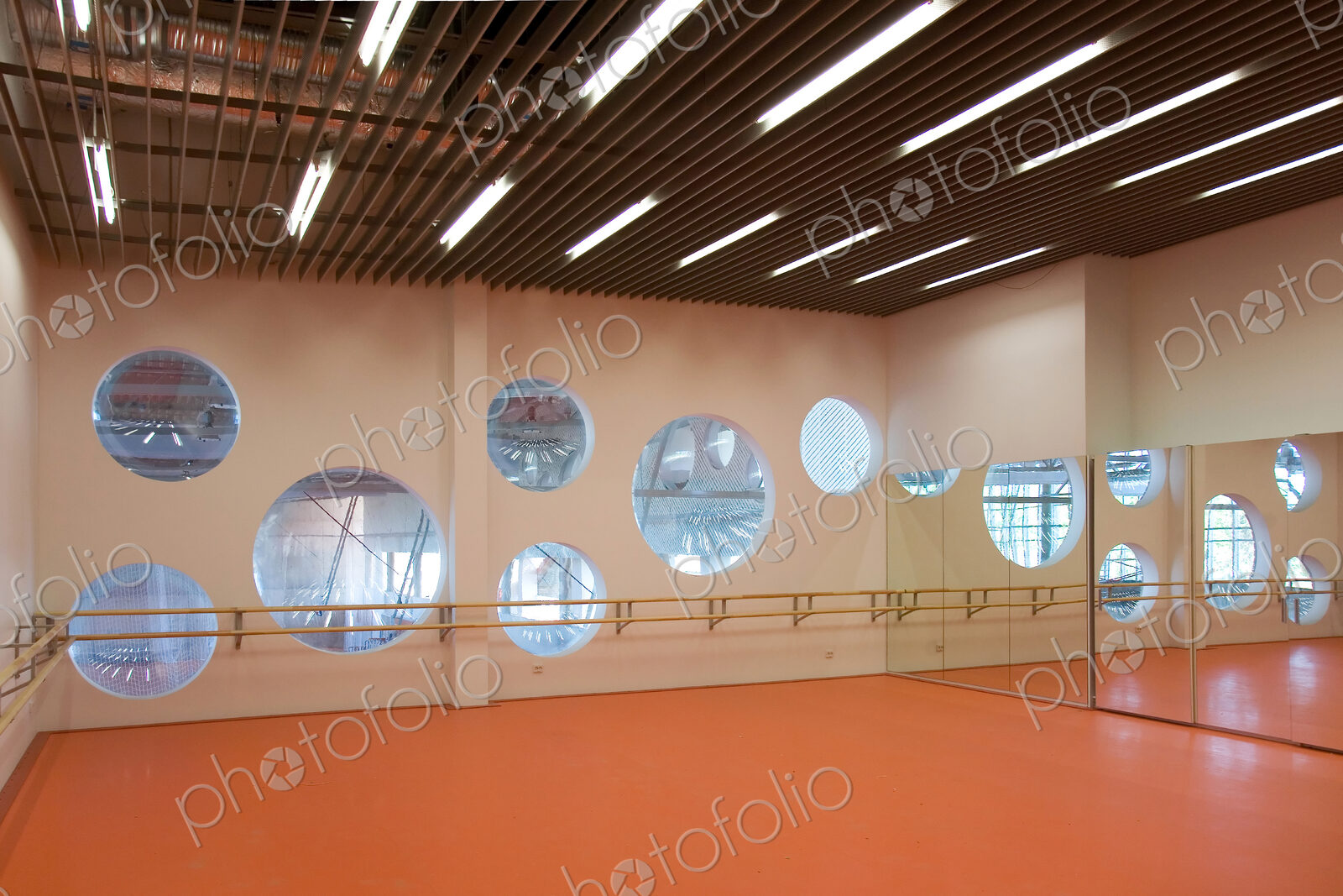 Modern university buildings, architecture and interior, studio with dance barre.