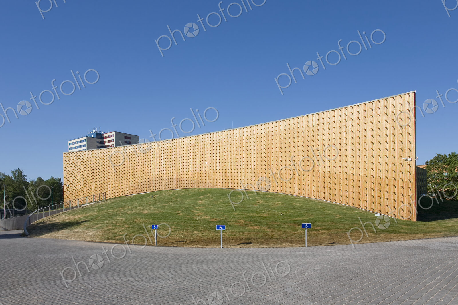 Modern university buildings, wooden beams and curved walls