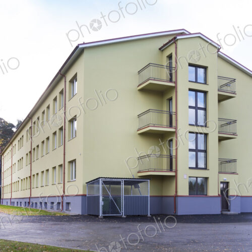 Modern youth hostel building, accommodation for travellers, building exterior Modern youth hostel building, accommodation for travellers, building exterior