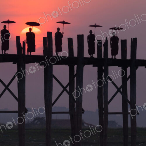 Monks on the U Bein Bridge, Amarapura, Myanmar Monks on the U Bein Bridge, Amarapura, Myanmar