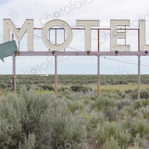 Motel sign in field of sage brush, near Waterville, Washington, USA. Motel sign in field of sage brush, near Waterville, Washington, USA.