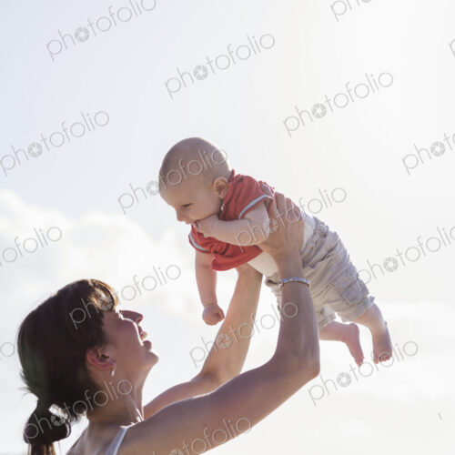 Mother playing with her baby boy. Mother playing with her baby boy.