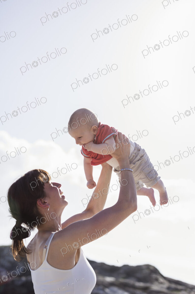 Mother playing with her baby boy.