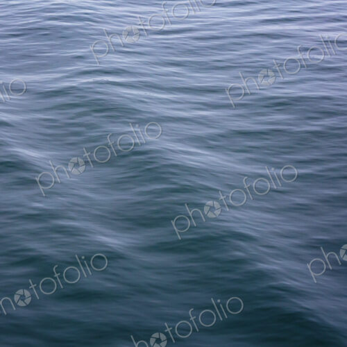 Motion blurred ocean waves, ripples in the surface. Motion blurred ocean waves, ripples in the surface.