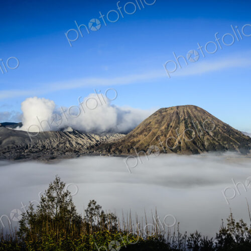 Mount Bromo volcano, a somma volcano and part of the Tengger mountains range, the cone… Mount Bromo volcano, a somma volcano and part of the Tengger mountains range, the cone…