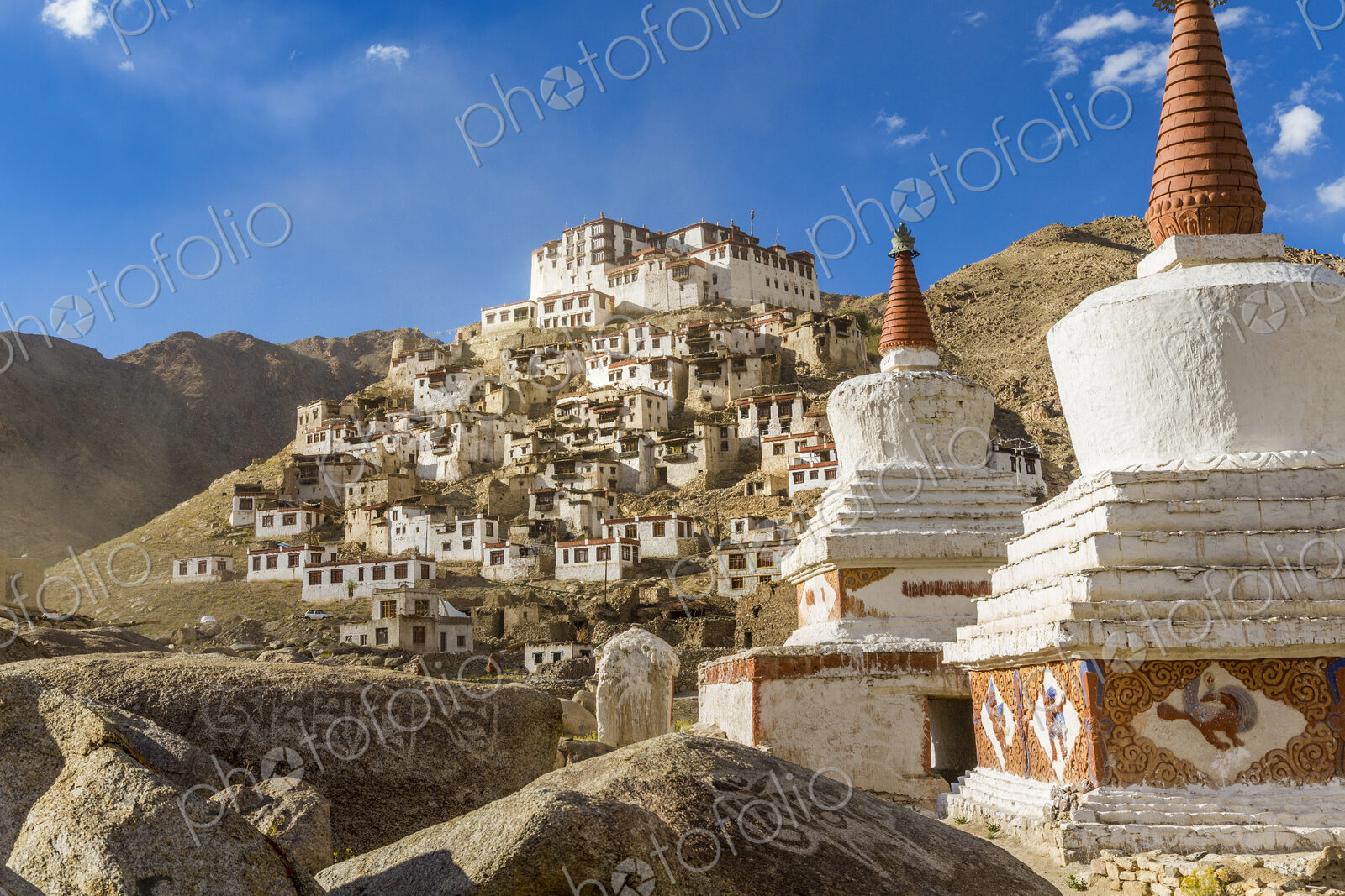 Mountain landscape with Buddhist monastery and stupa of a temple.