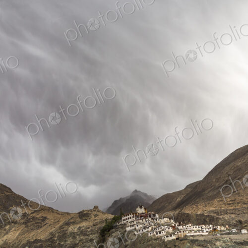 Mountain landscape with monastery under a cloudy sky. Mountain landscape with monastery under a cloudy sky.
