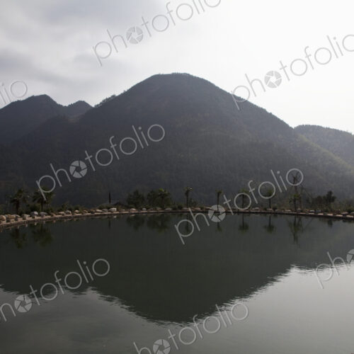 Mountain with reflection in lake.