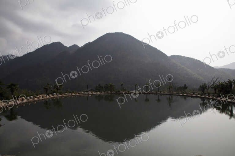 Mountain with reflection in lake.