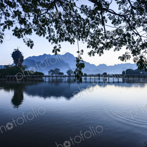 Mountains and the still waters of the Hpa An lake. Mountains and the still waters of the Hpa An lake.
