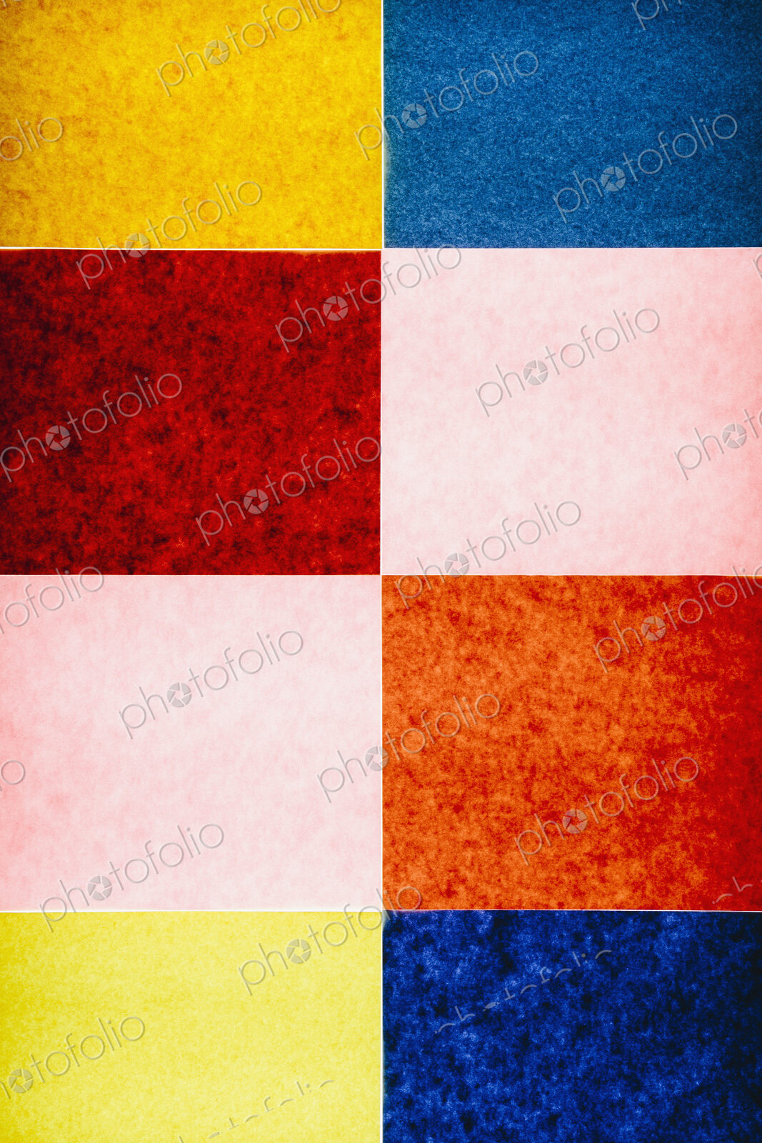 Multi-colored pieces of recycled construction paper. A pattern of rectangles, in…