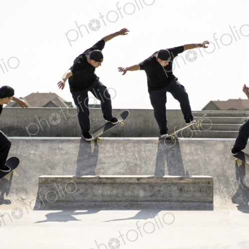 Multiple exposure of Caucasian man riding skateboard in skate park Multiple exposure of Caucasian man riding skateboard in skate park