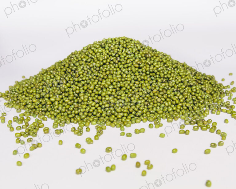 Mung beans, also known as green gram or golden gram, native to India. Heaped on a…