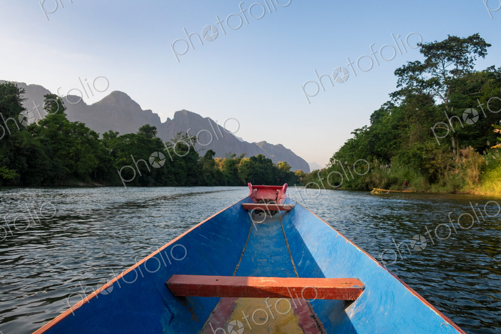 Nam Song River, a boat on the water at Vang Vieng, Laos