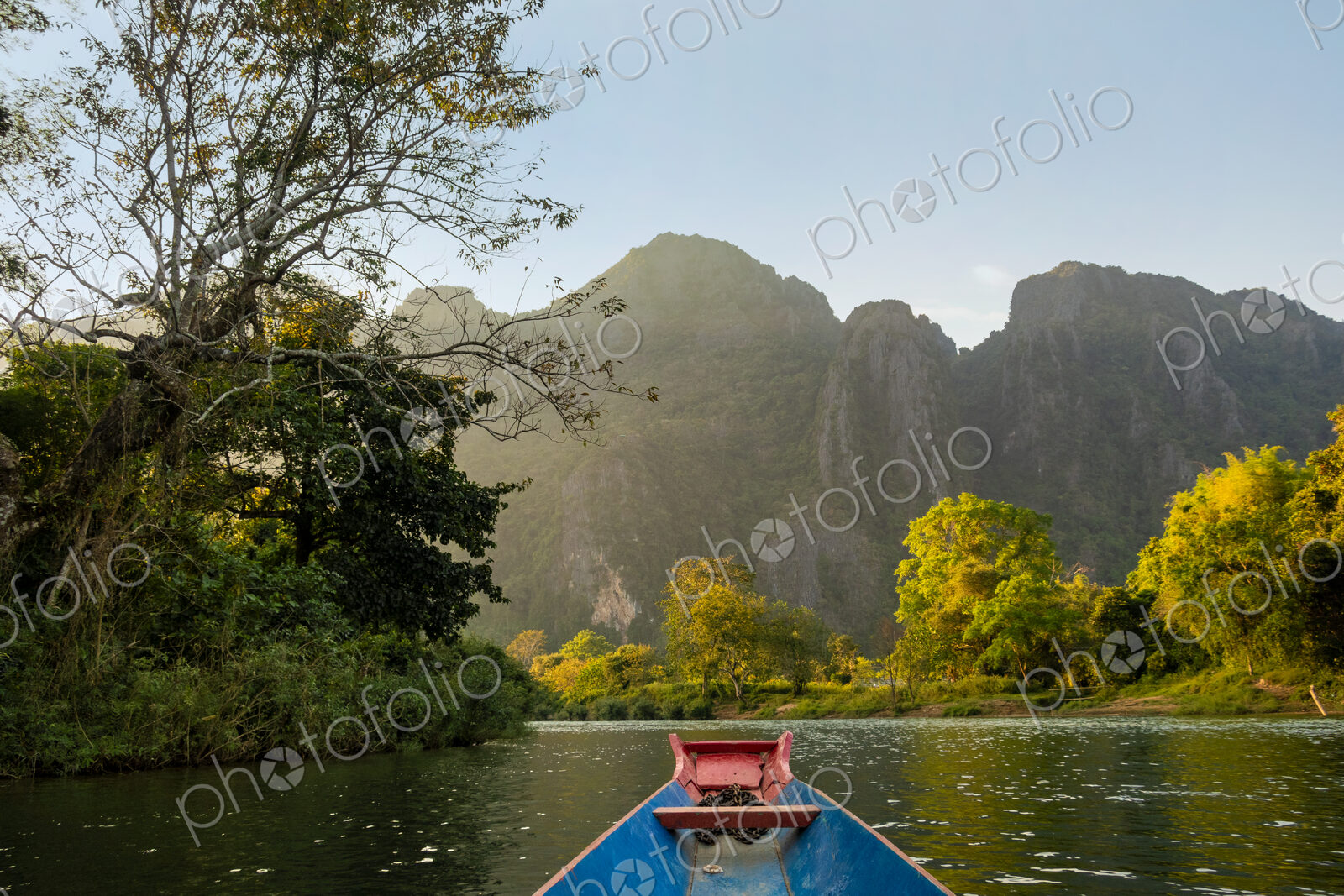Nam Song River, a boat on the water at Vang Vieng, Laos