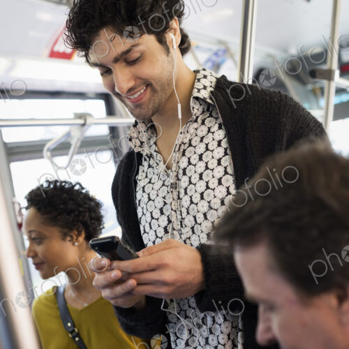 New York City park. People, men and women on a city bus. Public transport. Keeping in…