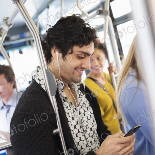 New York City park. People, men and women on a city bus. Public transport. Keeping in…