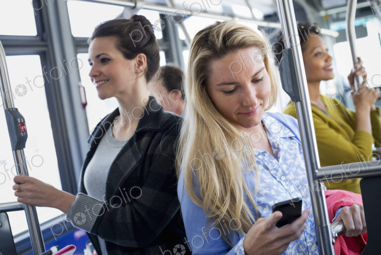 New York City park. People, men and women on a city bus. Public transport. Keeping in…