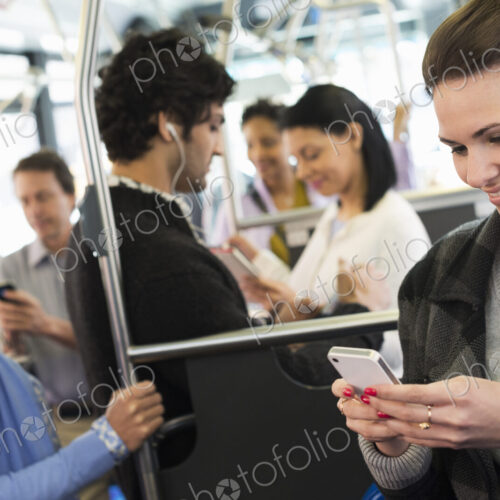 New York City park. People, men and women on a city bus. Public transport. Keeping in…