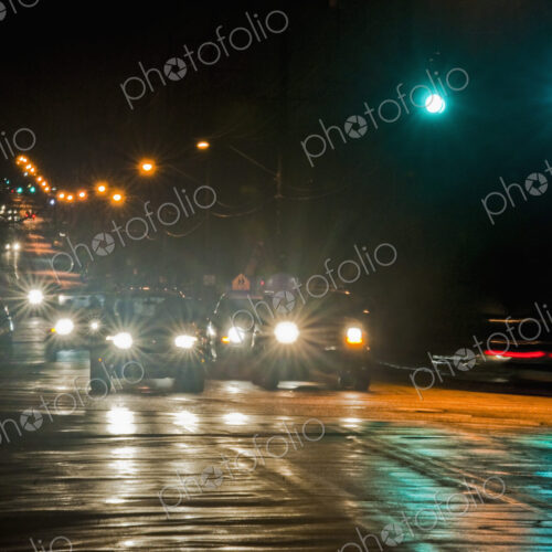 Night Traffic on a Wet Street Night Traffic on a Wet Street