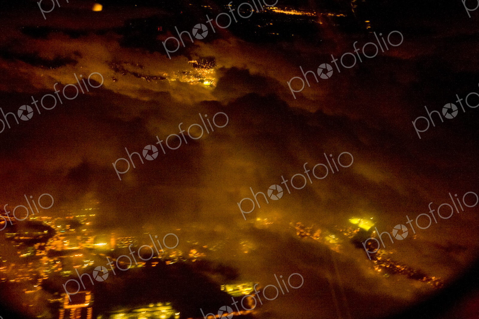 Night aerial view of Illuminated urban areas of a city.