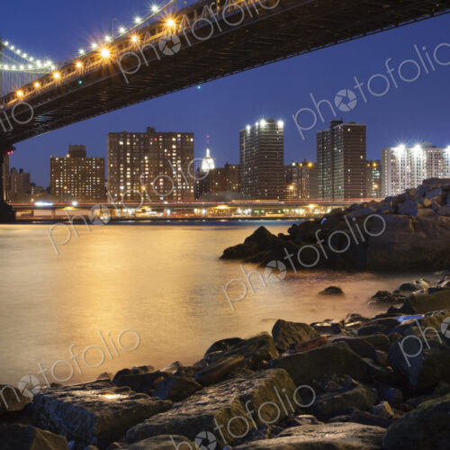 Night view towards Manhattan from Brooklyn, with the Manhattan Bridge spanning the… Night view towards Manhattan from Brooklyn, with the Manhattan Bridge spanning the…
