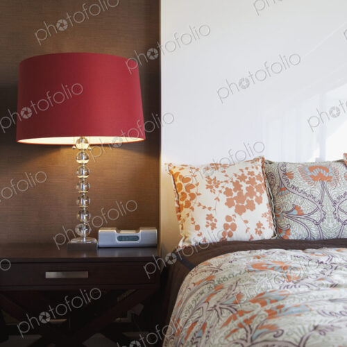 Nightstand and Lamp Next to a Bed Nightstand and Lamp Next to a Bed