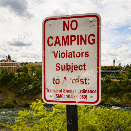 No camping sign by the Spokane River No camping sign by the Spokane River