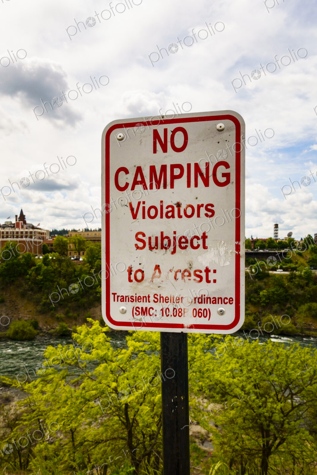 No camping sign by the Spokane River