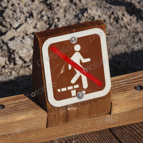 No walking sign on pathway in Death Valley, CA USA No walking sign on pathway in Death Valley, CA USA