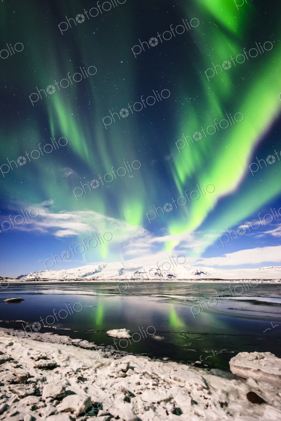 Northern lights reflecting in still remote river