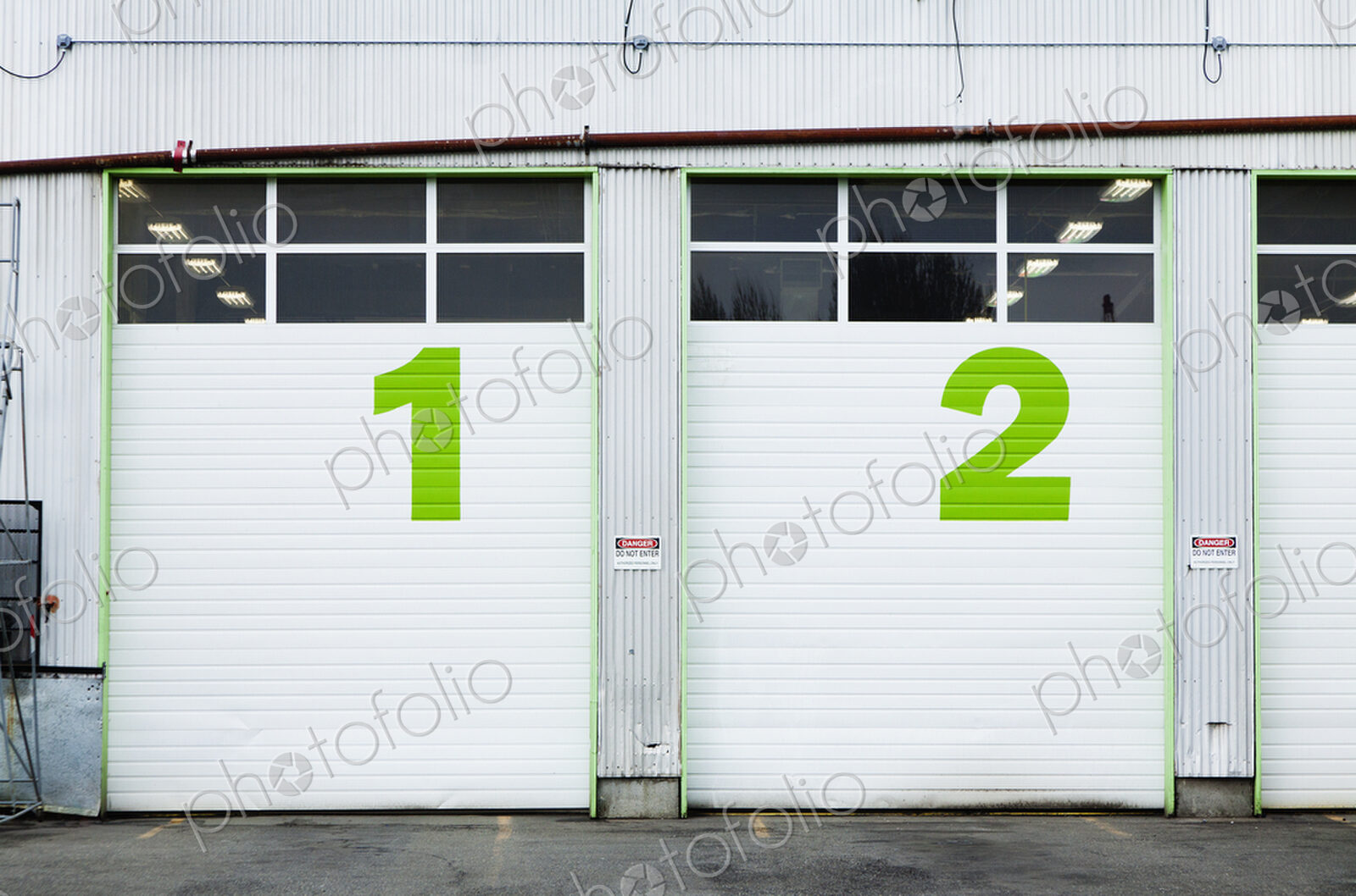 Numbers 1 and 2 On Repair Shop Bay Doors