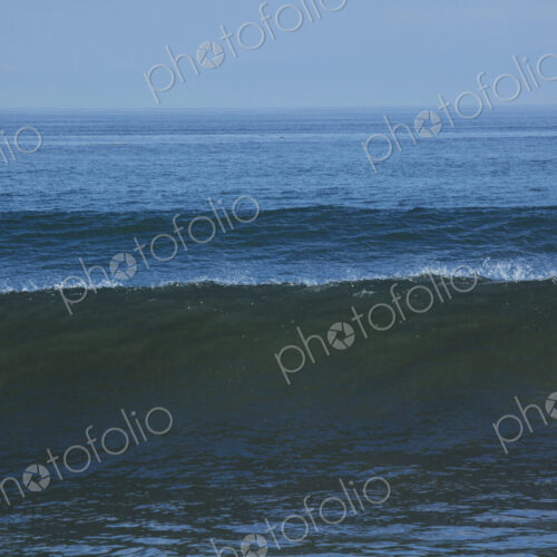 Ocean Waves reaching the shore, white water and spray. Ocean Waves reaching the shore, white water and spray.