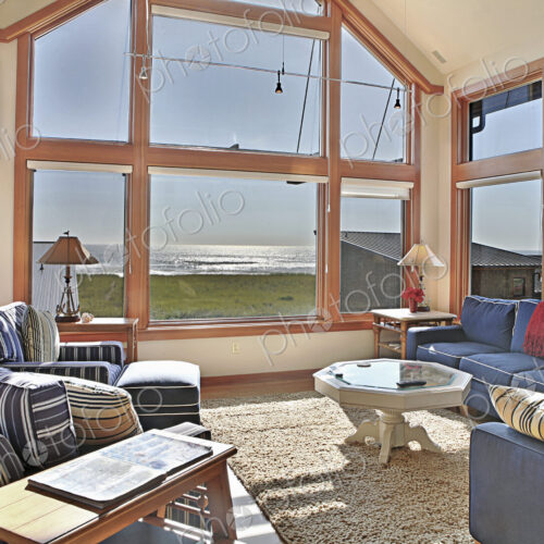 Ocean view through living room window Ocean view through living room window