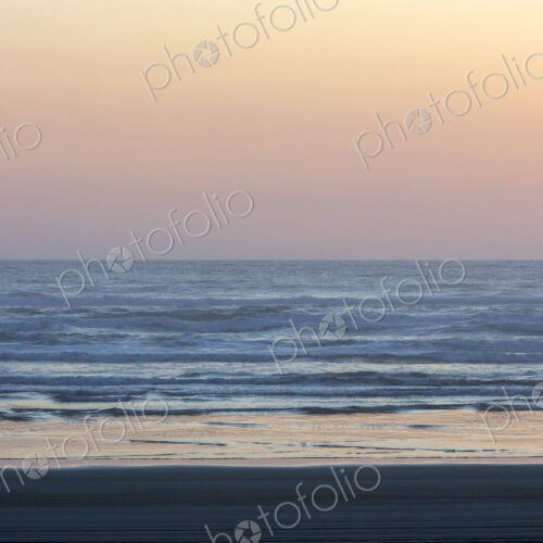 Ocean waves and beach at sunset Ocean waves and beach at sunset