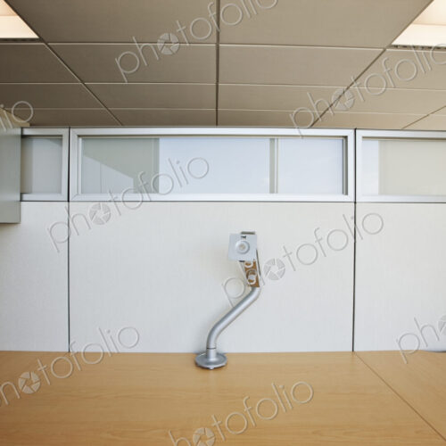 Office cubicle desk and lamp.