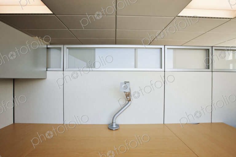 Office cubicle desk and lamp.