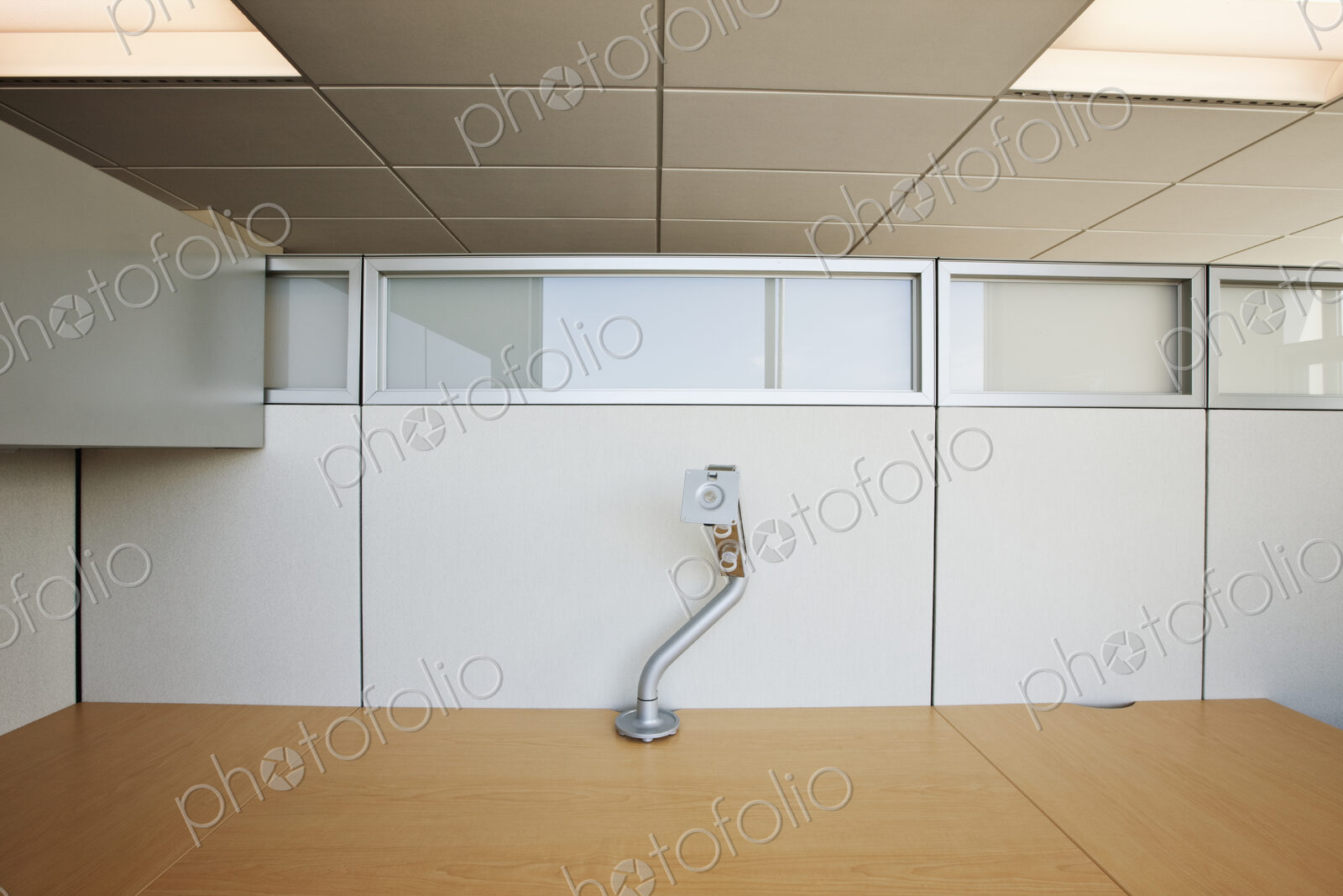 Office cubicle desk and lamp.